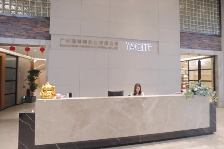 A receptionist working at the company's front desk.