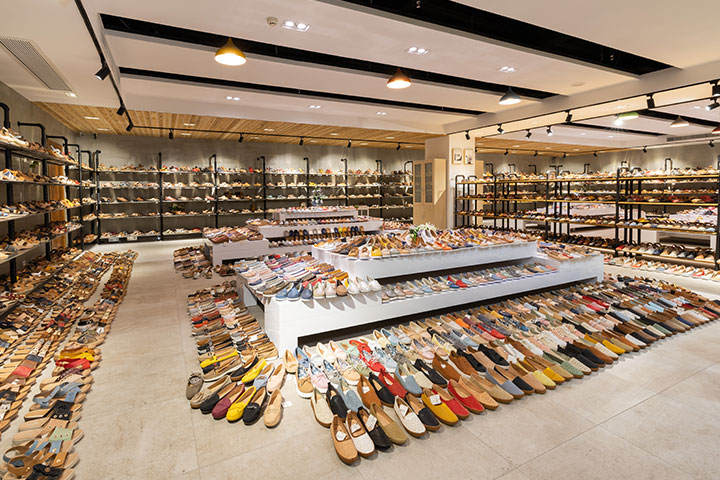 A showroom full of fashion ladies' shoes.